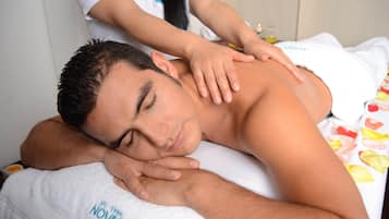 Guests can unwind with a soothing back massage in this serene retreat.