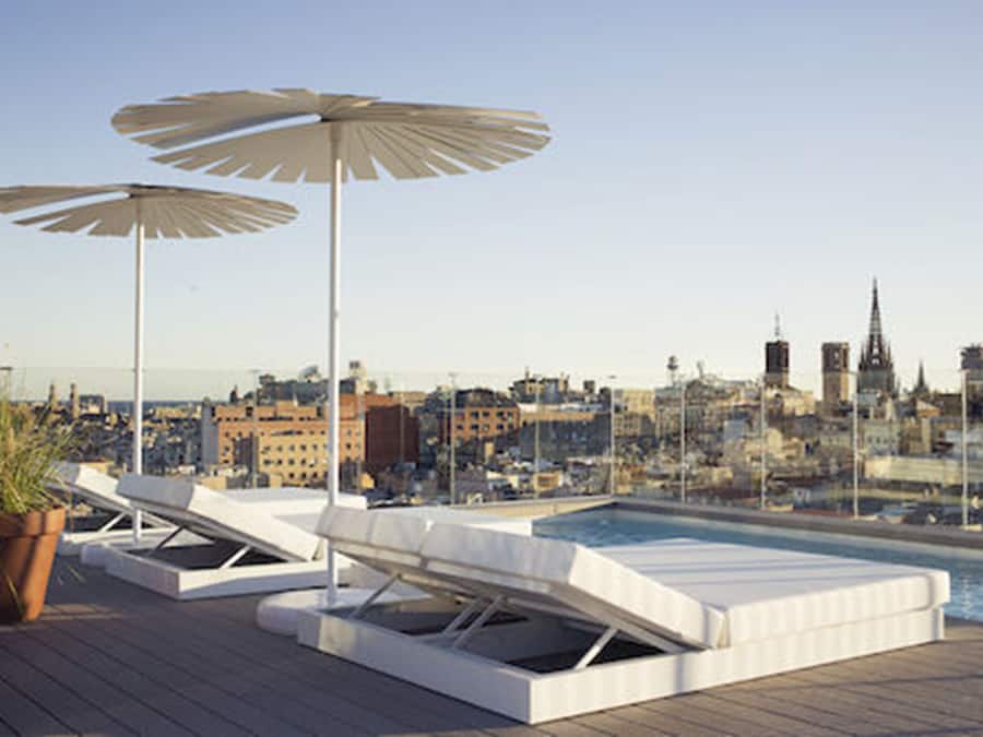 Outdoor pool, pool umbrellas, sun loungers