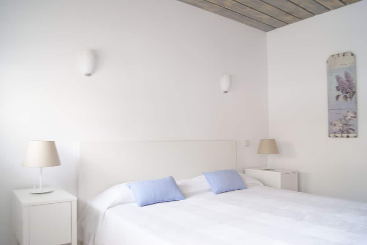 Apartment, 1 Bedroom, Ground Floor (Reformed) | 1 bedroom, in-room safe, desk, iron/ironing board