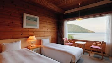 Family Twin Room | Premium bedding, in-room safe, blackout drapes