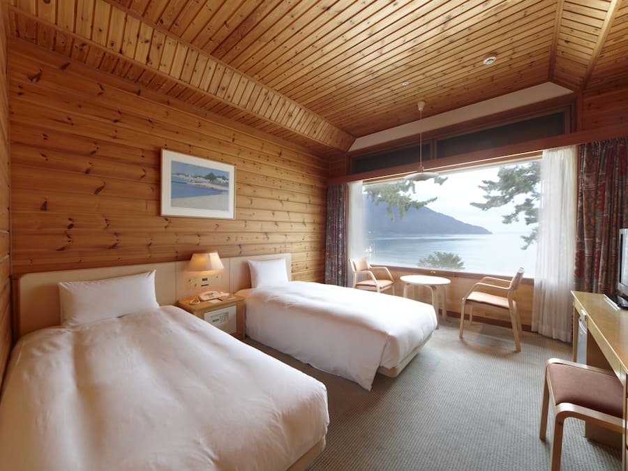 Basic Twin Room | Premium bedding, in-room safe, blackout curtains, iron/ironing board