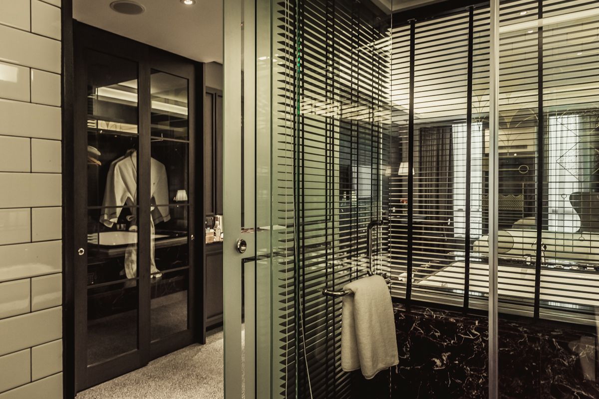 brewster studio | bathroom | separate bathtub and shower, rainfall showerhead, designer toiletries