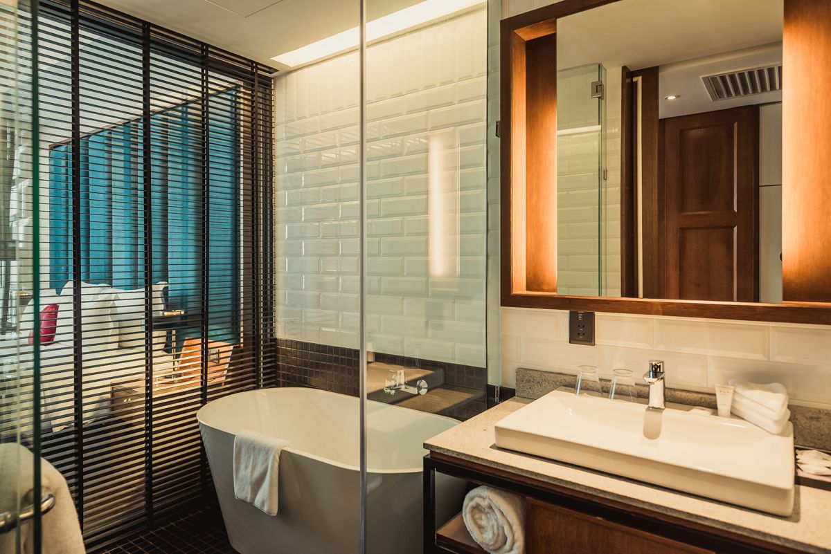 telegraph cosy | bathroom | separate bathtub and shower, rainfall showerhead, designer toiletries