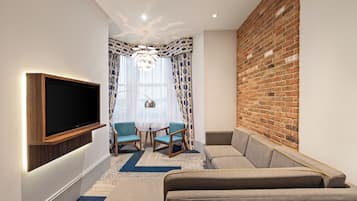 Desk, iron/ironing board, travel cot, free WiFi