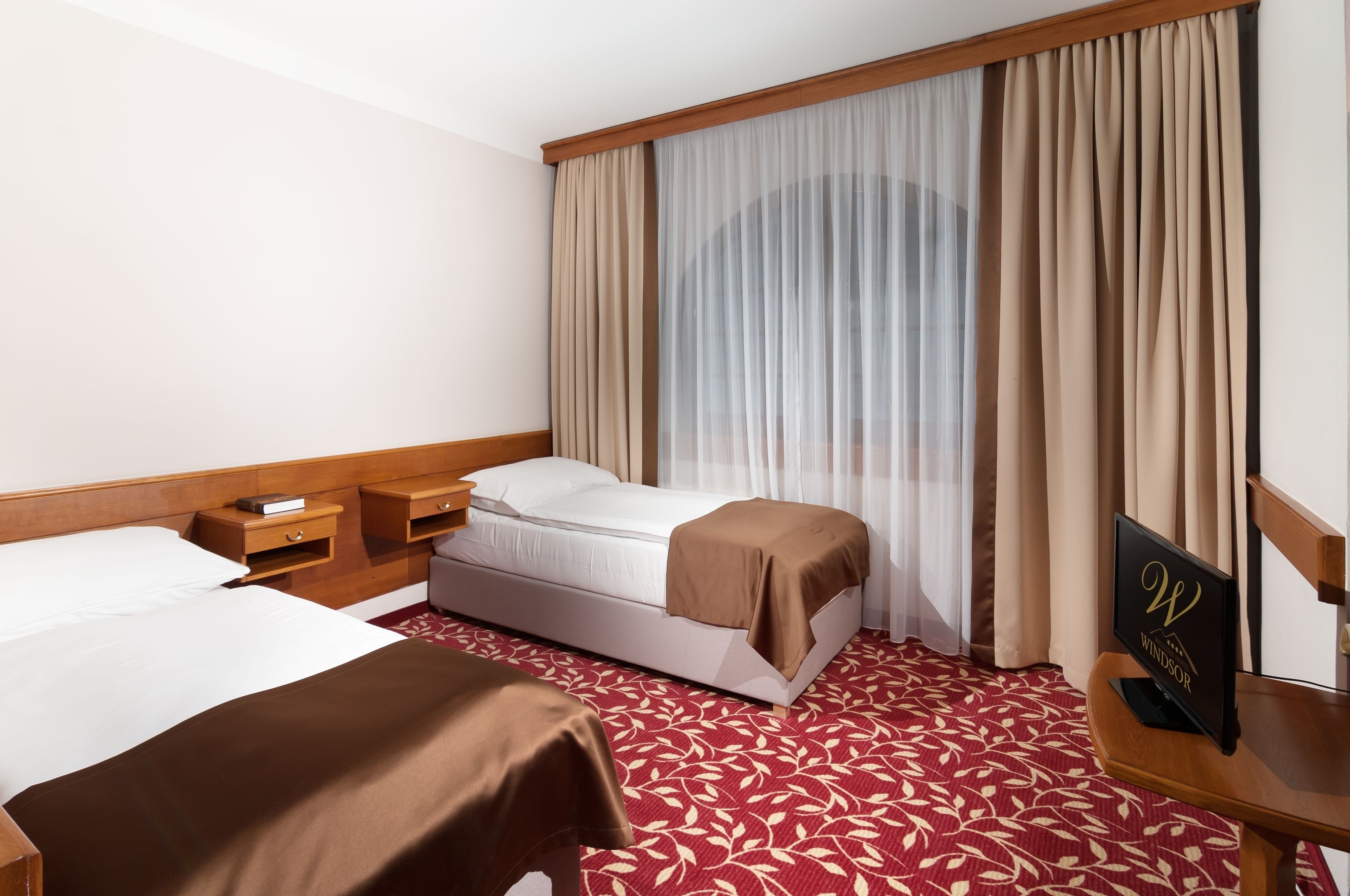 family room, 2 bedrooms | minibar, in-room safe, desk, blackout curtains