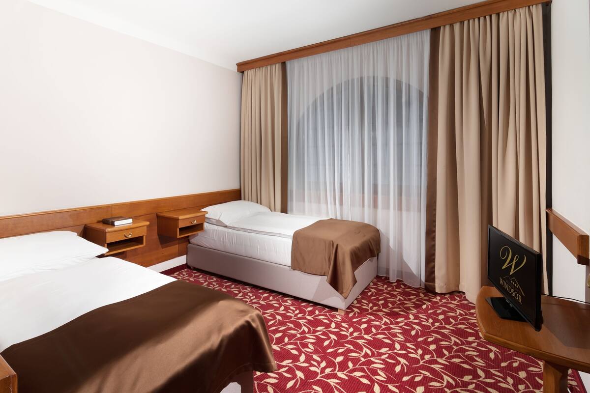 family room, 2 bedrooms | minibar, in-room safe, desk, blackout curtains