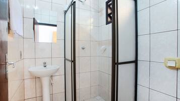 Quadruple Room, Multiple Beds | Bathroom | Shower, free toiletries, hair dryer, towels