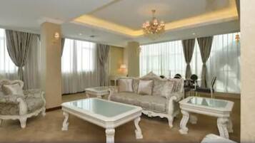 Executive Suite | Living area | Plasma TV