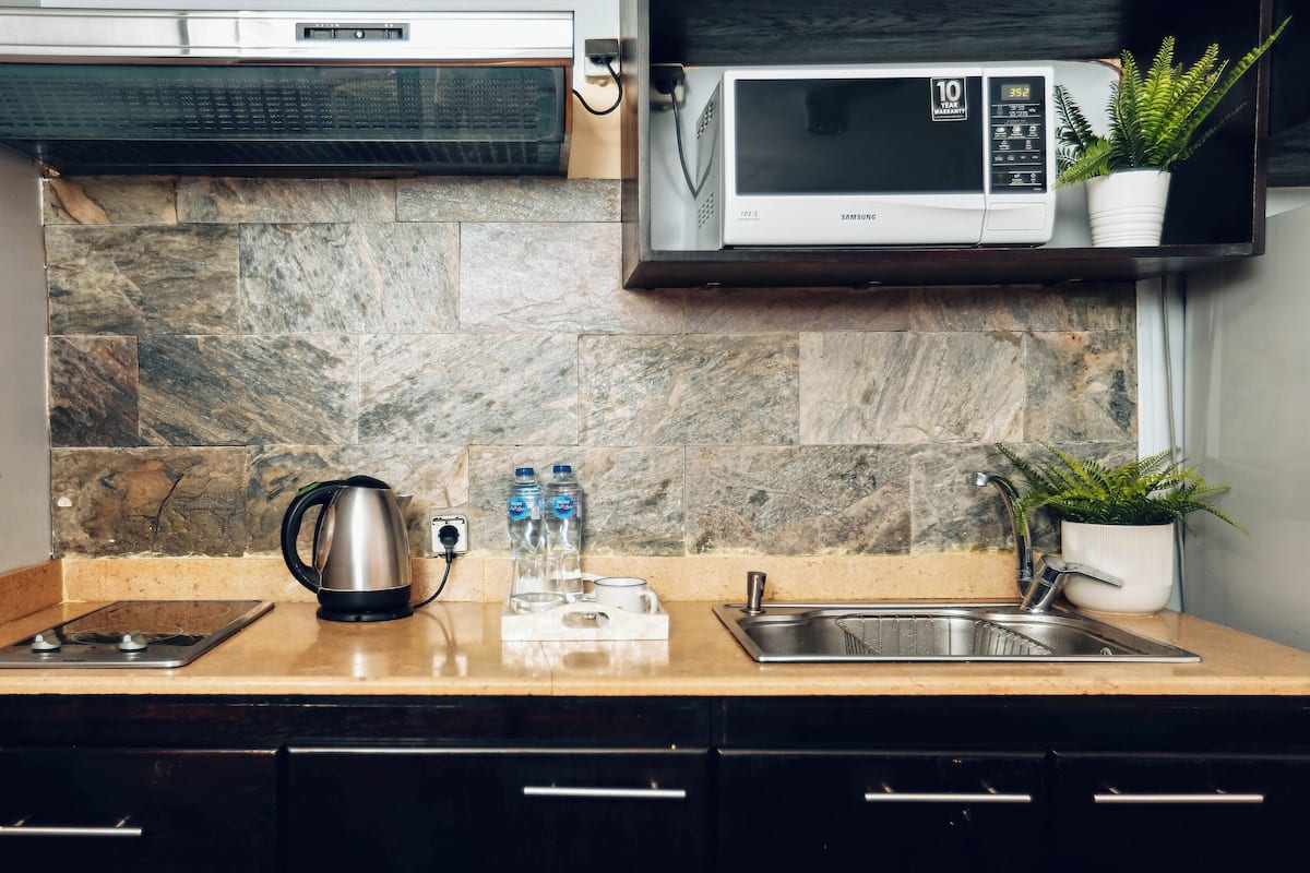 Suite familiar, 3 dormitoris, cuina bàsica | 1 dormitori, roba de llit d'alta qualitat i minibar