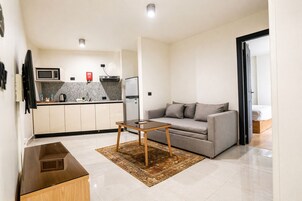 Junior One-Bedroom Suite with Kitchenette | Premium bedding, minibar, individually decorated, individually furnished