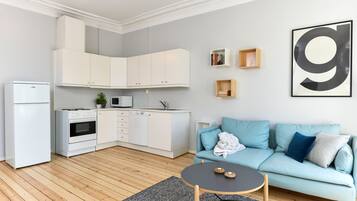 One-Bedroom Apartment For Two | Living room | Flat-screen TV