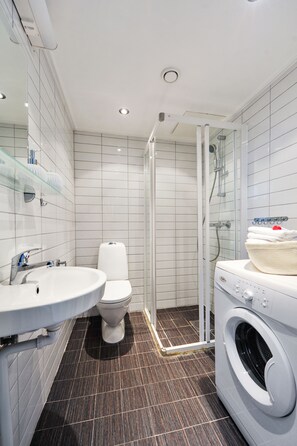 Shower, towels, toilet paper