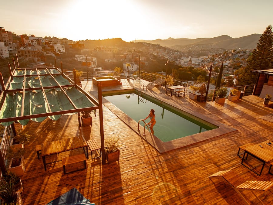 Outdoor pool, open 9:00 AM to 7:00 PM, pool loungers