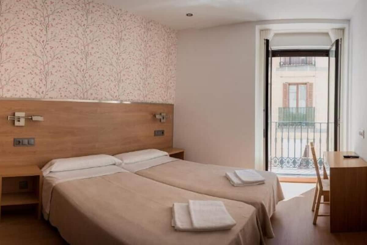 Desk, blackout drapes, iron/ironing board (on request), WiFi (free)