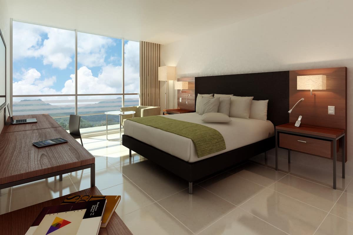 standard room, 1 king bed | minibar, in-room safe, desk, blackout curtains