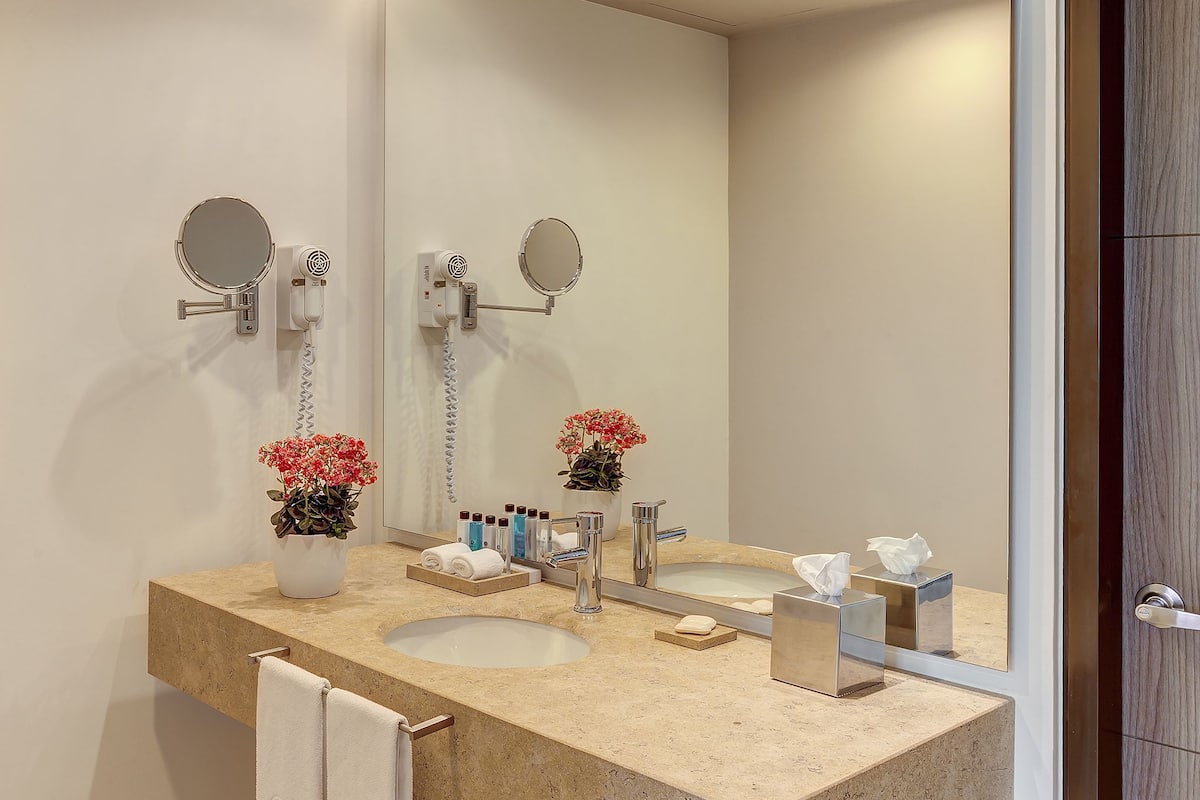 shower, rainfall showerhead, slippers, towels