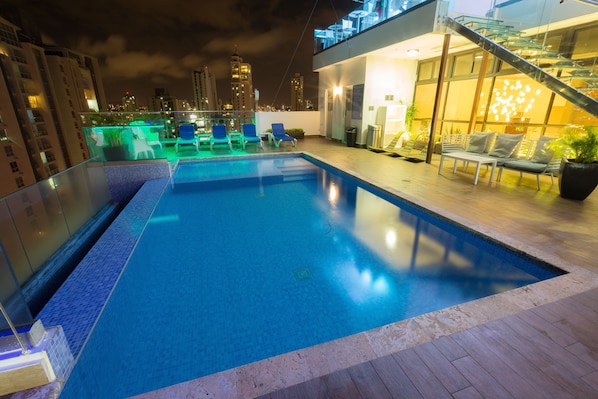 Outdoor pool, pool umbrellas, pool loungers