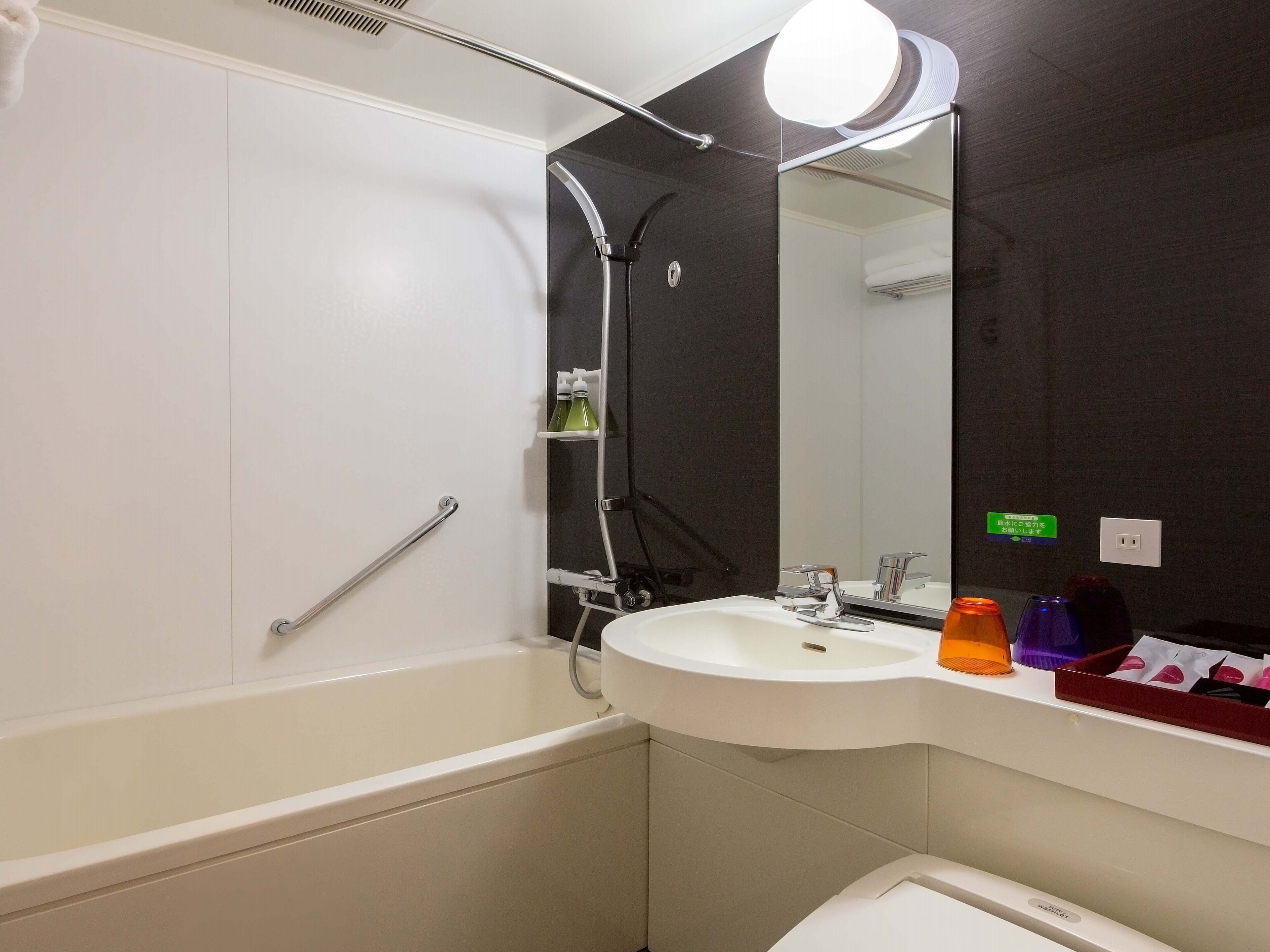 combined shower/bathtub, free toiletries, hair dryer, bathrobes