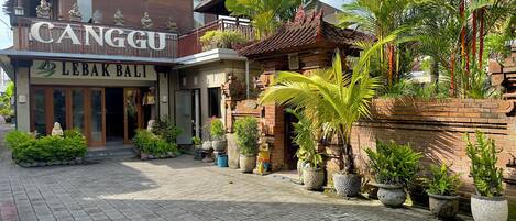 A traditional building with a sign reading "LEBAK BALI" and "CANGGU".