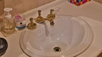 Shower, free toiletries, hair dryer, slippers