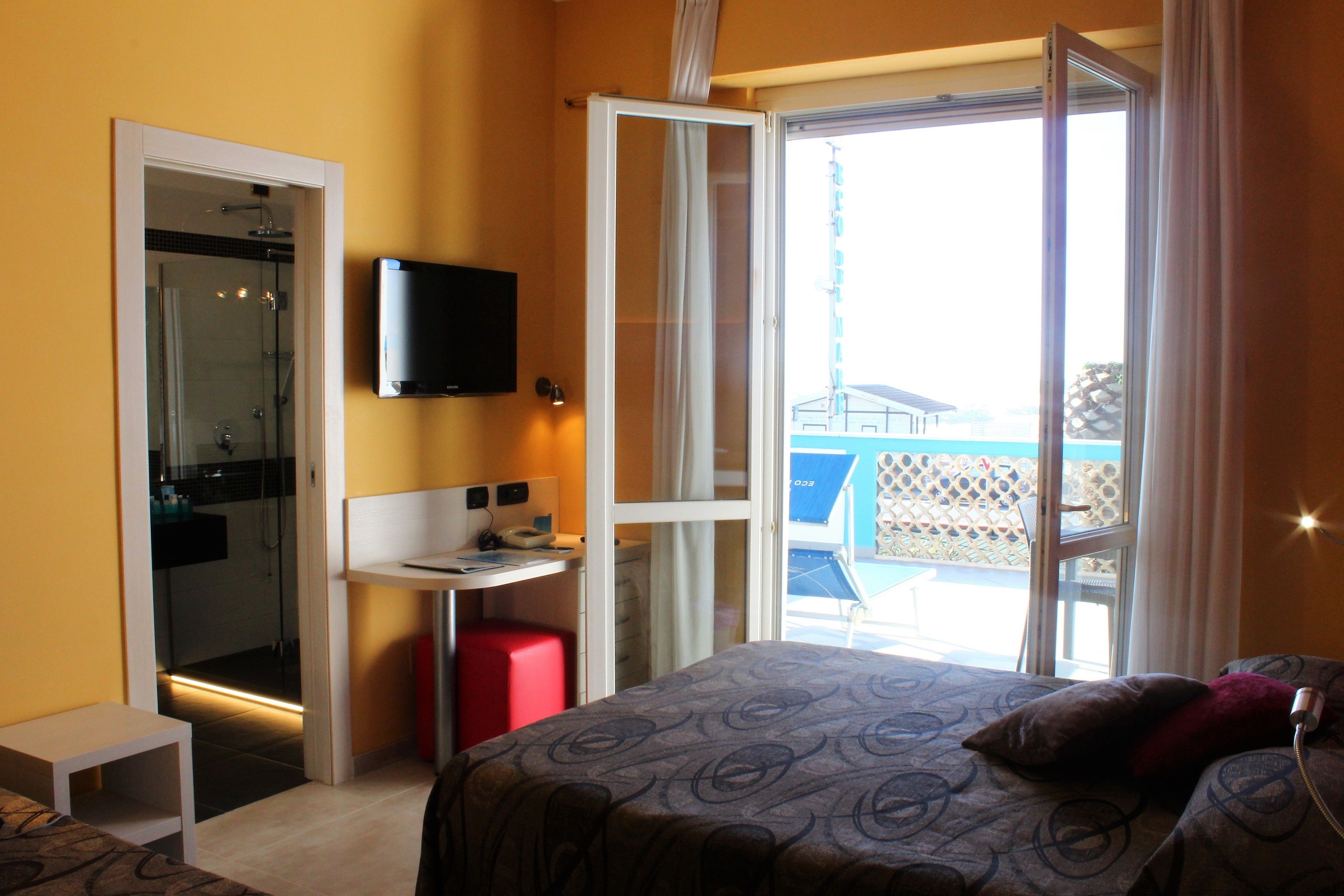 triple room, sea view | minibar, in-room safe, desk, soundproofing