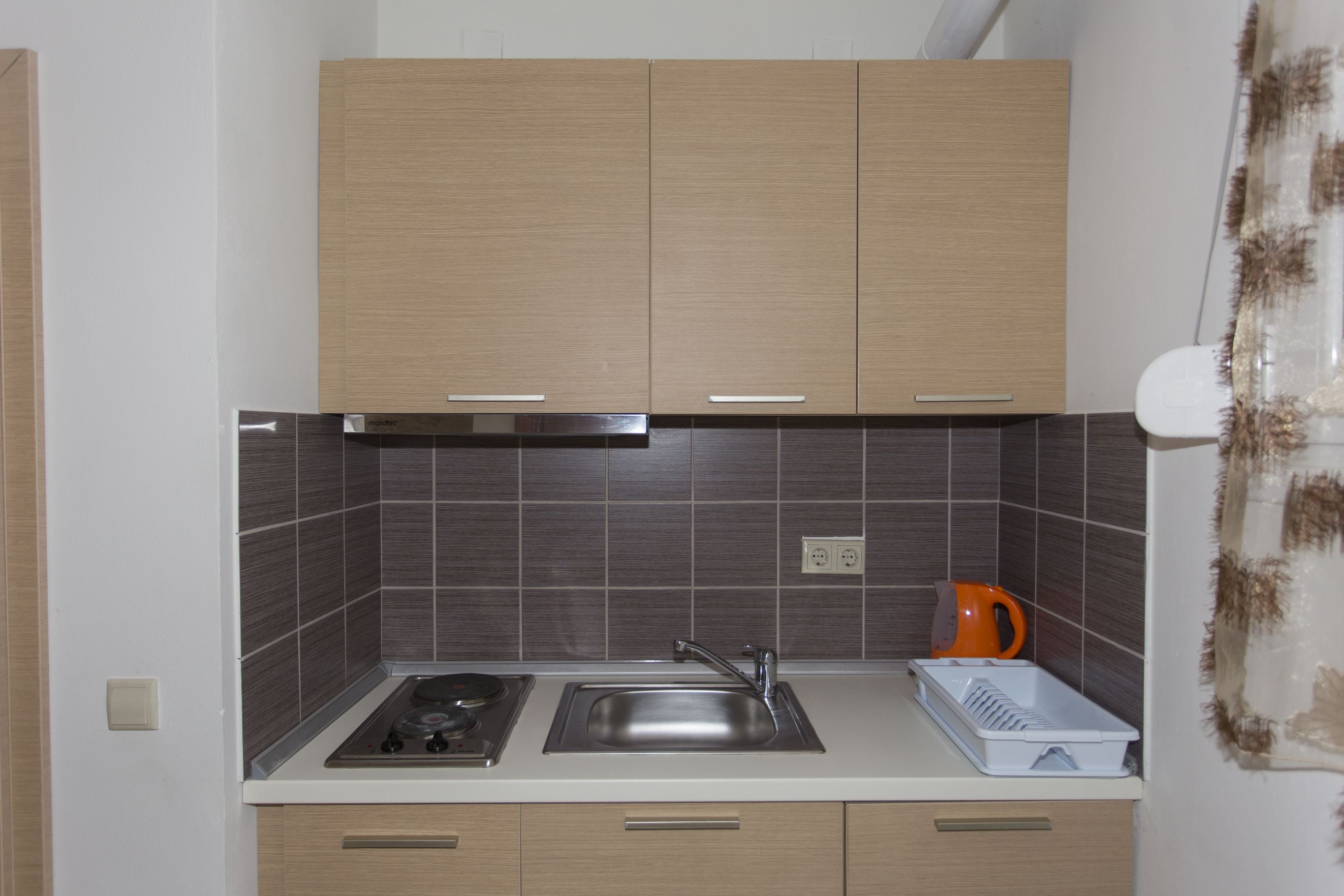 Triple Room, Garden View | Private kitchen | Fridge, coffee/tea maker