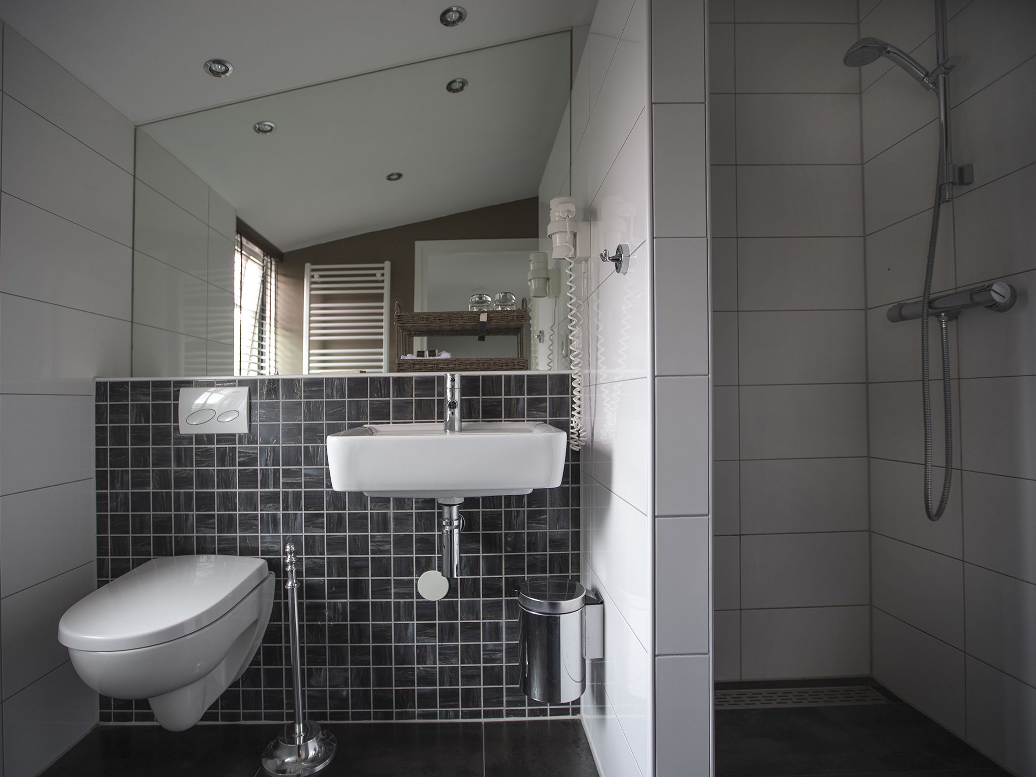 standard double room | bathroom | designer toiletries, hair dryer, towels