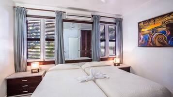 Apartment, Ocean View, Beachfront | In-room safe, iron/ironing board, free WiFi, bed sheets