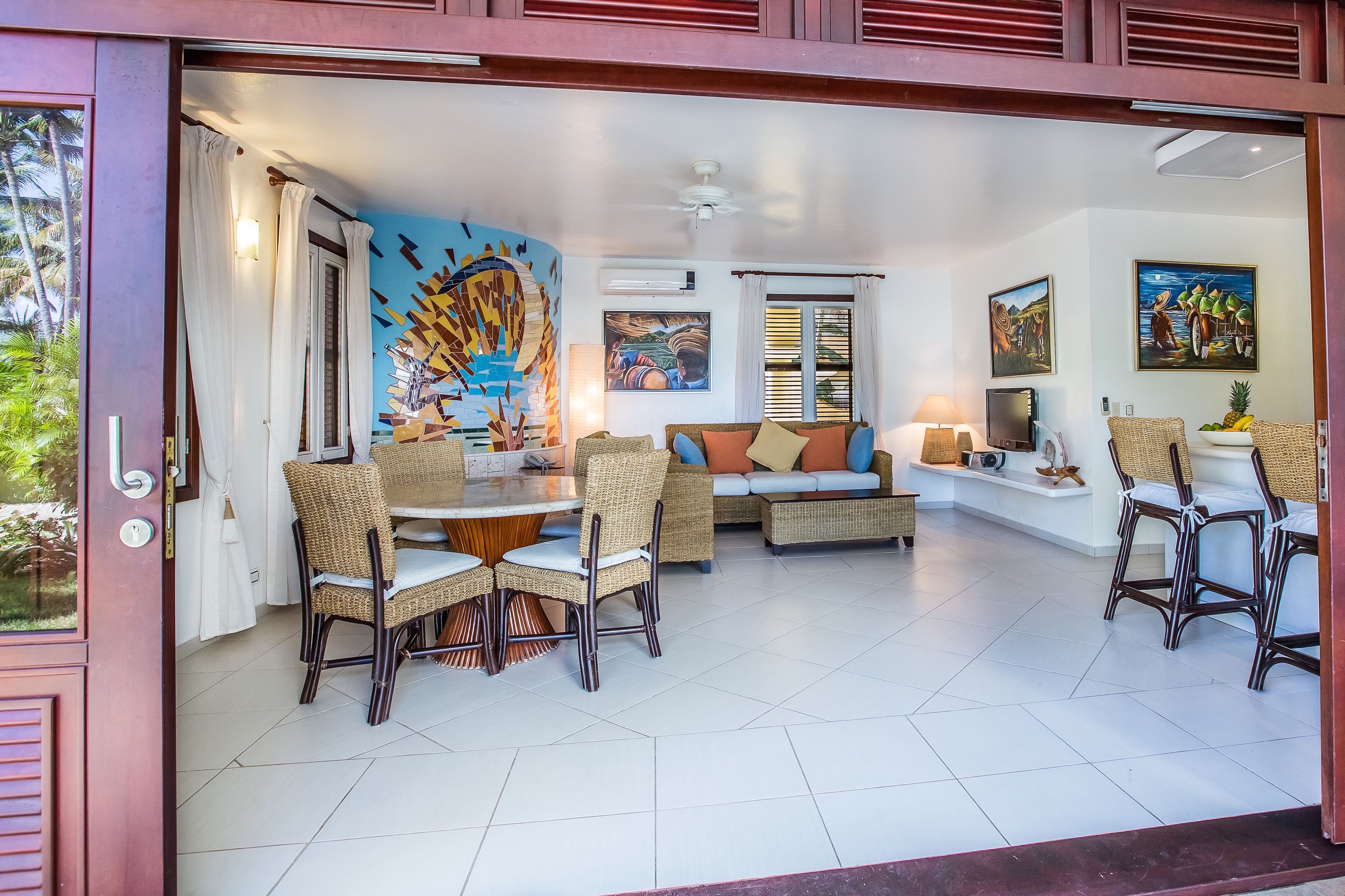 apartment, ocean view, beachfront | living room | flat-screen tv