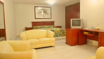 Suite junior | Área de sala de estar | Televisión