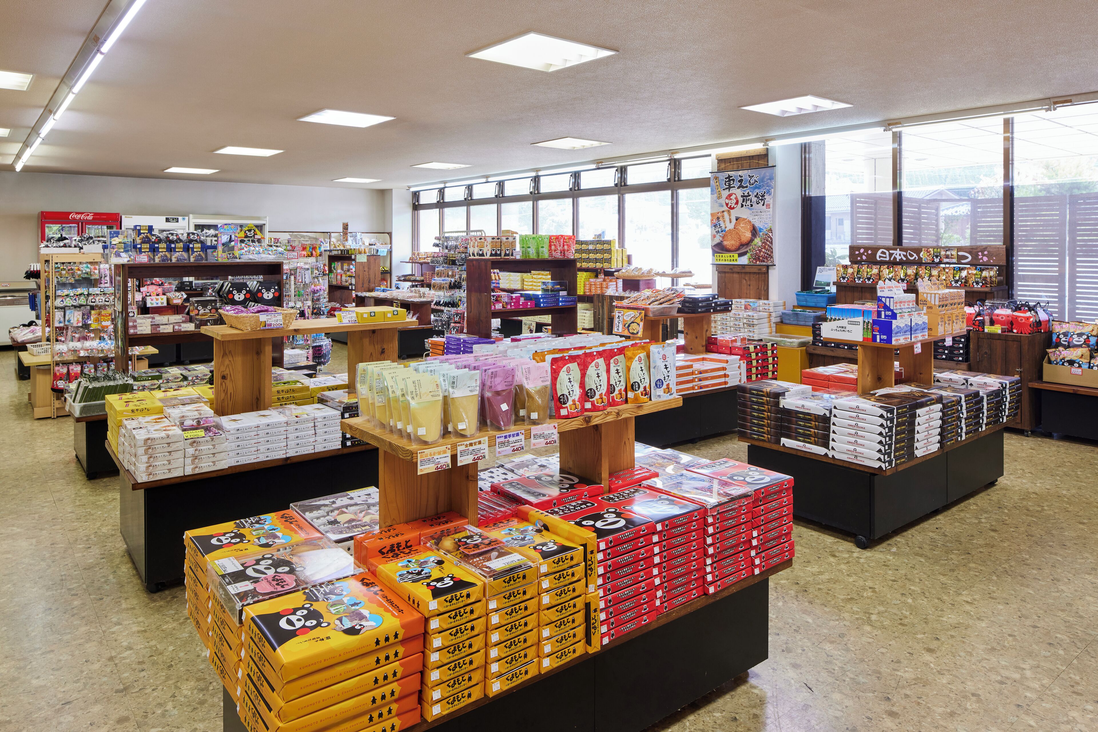 A store with various boxed products on display, including food items and possibly snacks.