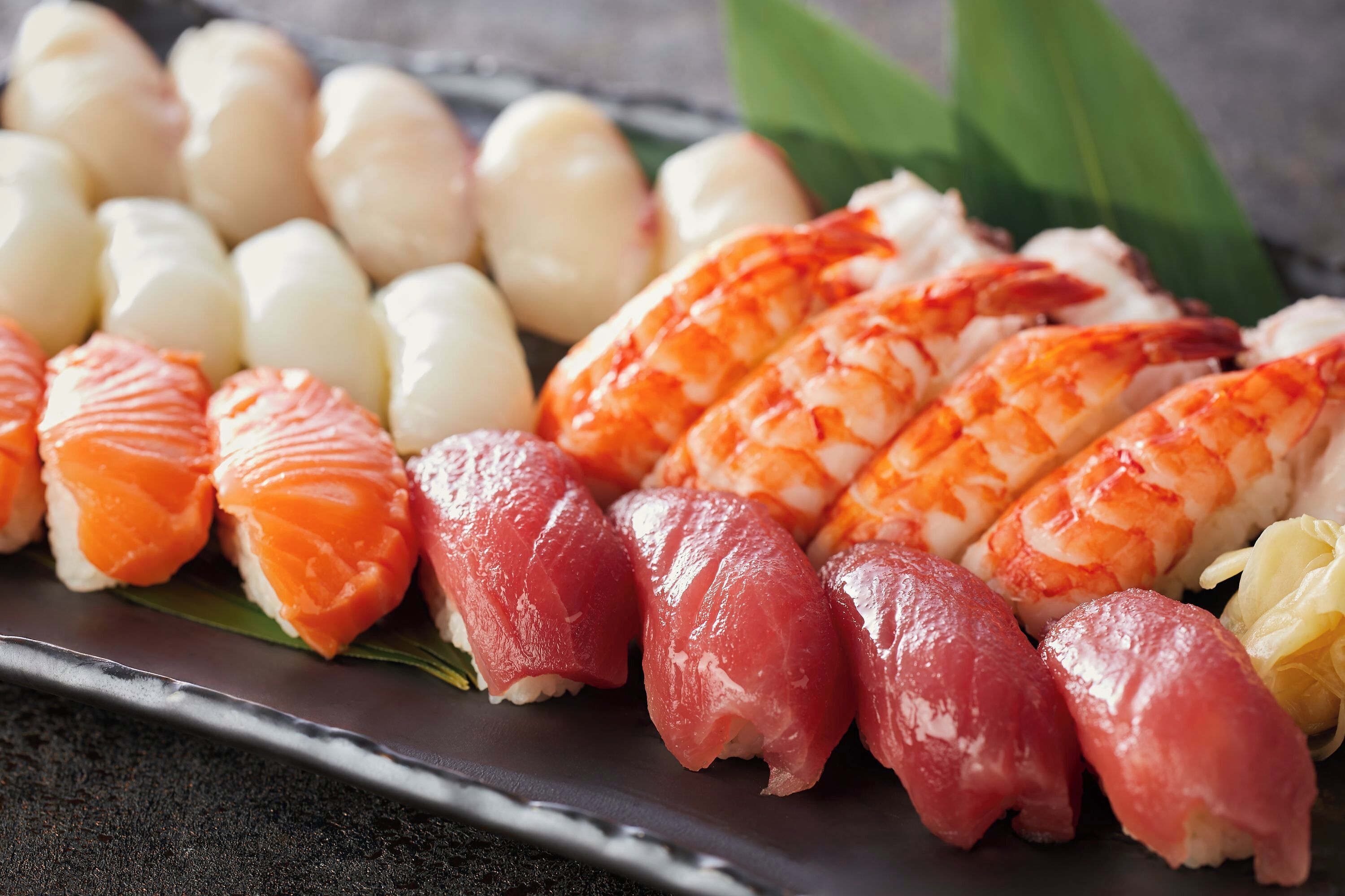 A variety of sushi on a plate.