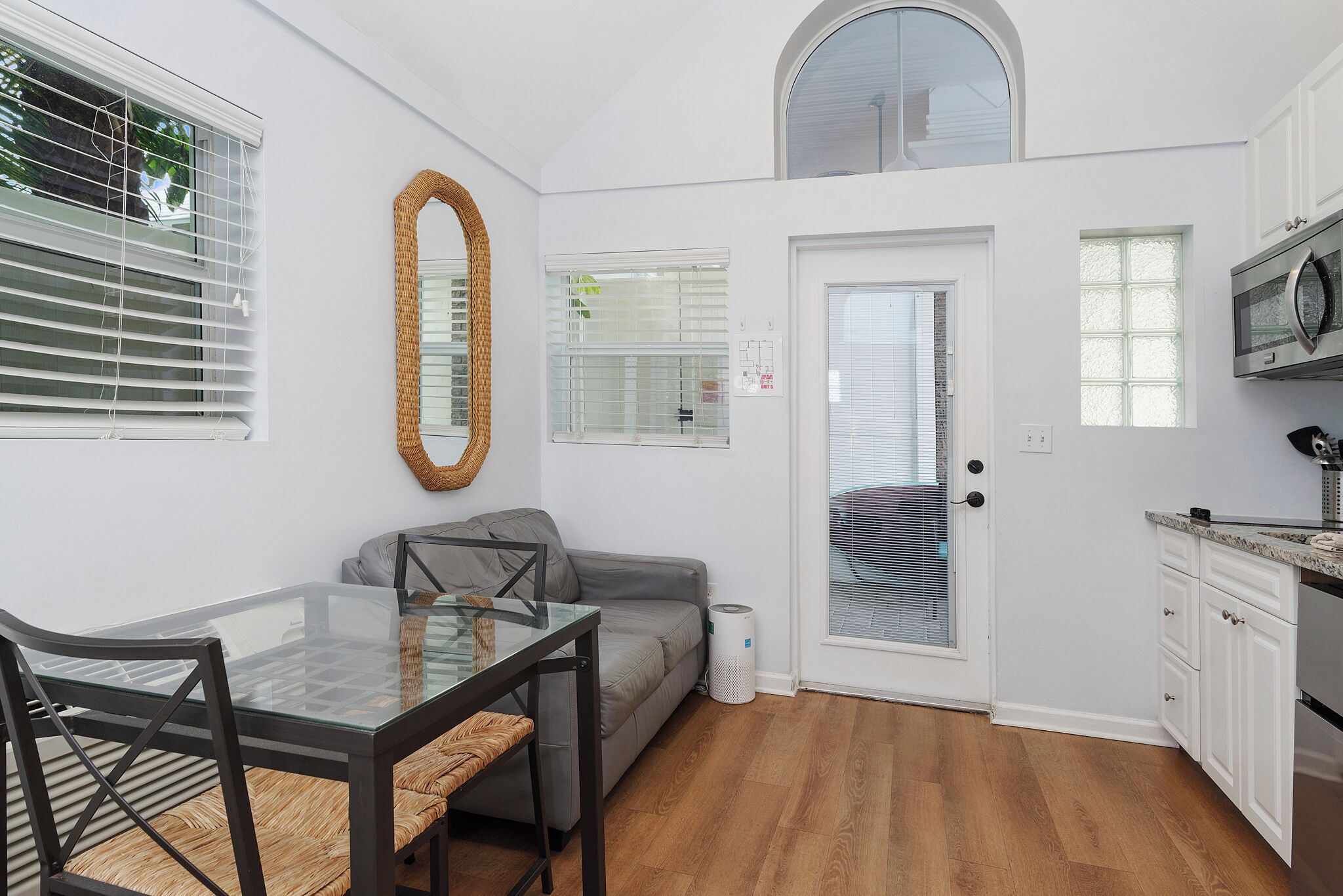 unit #5 studio, 1 queen bed, kitchen | living area | 32-inch tv with cable channels