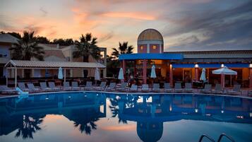 Seasonal outdoor pool, pool umbrellas, pool loungers