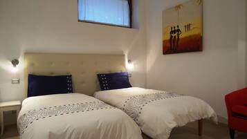 Quadruple Room, 1 Bedroom, Non Smoking | Premium bedding, down comforters, desk, blackout drapes