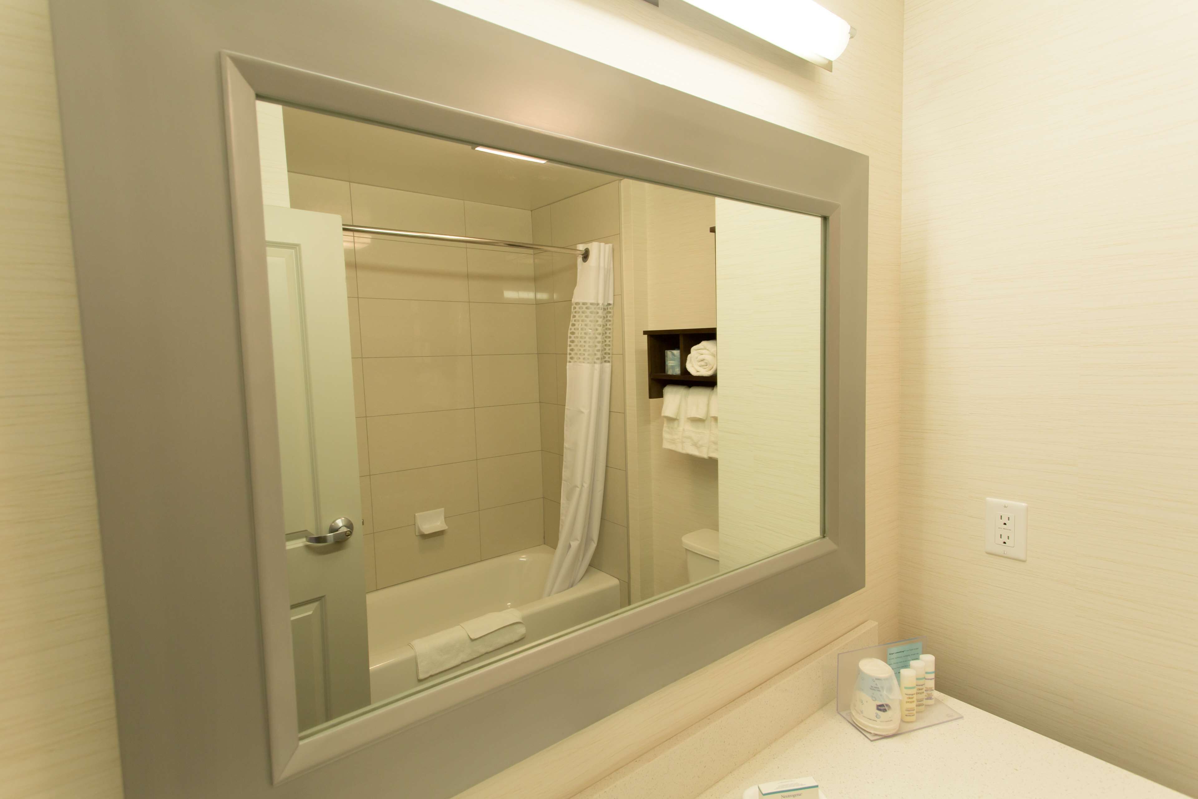 room, 2 queen beds, refrigerator & microwave | bathroom | designer toiletries, hair dryer, towels, soap