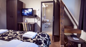 Literie de qualité supérieure, surmatelas, fer et planche à repasser