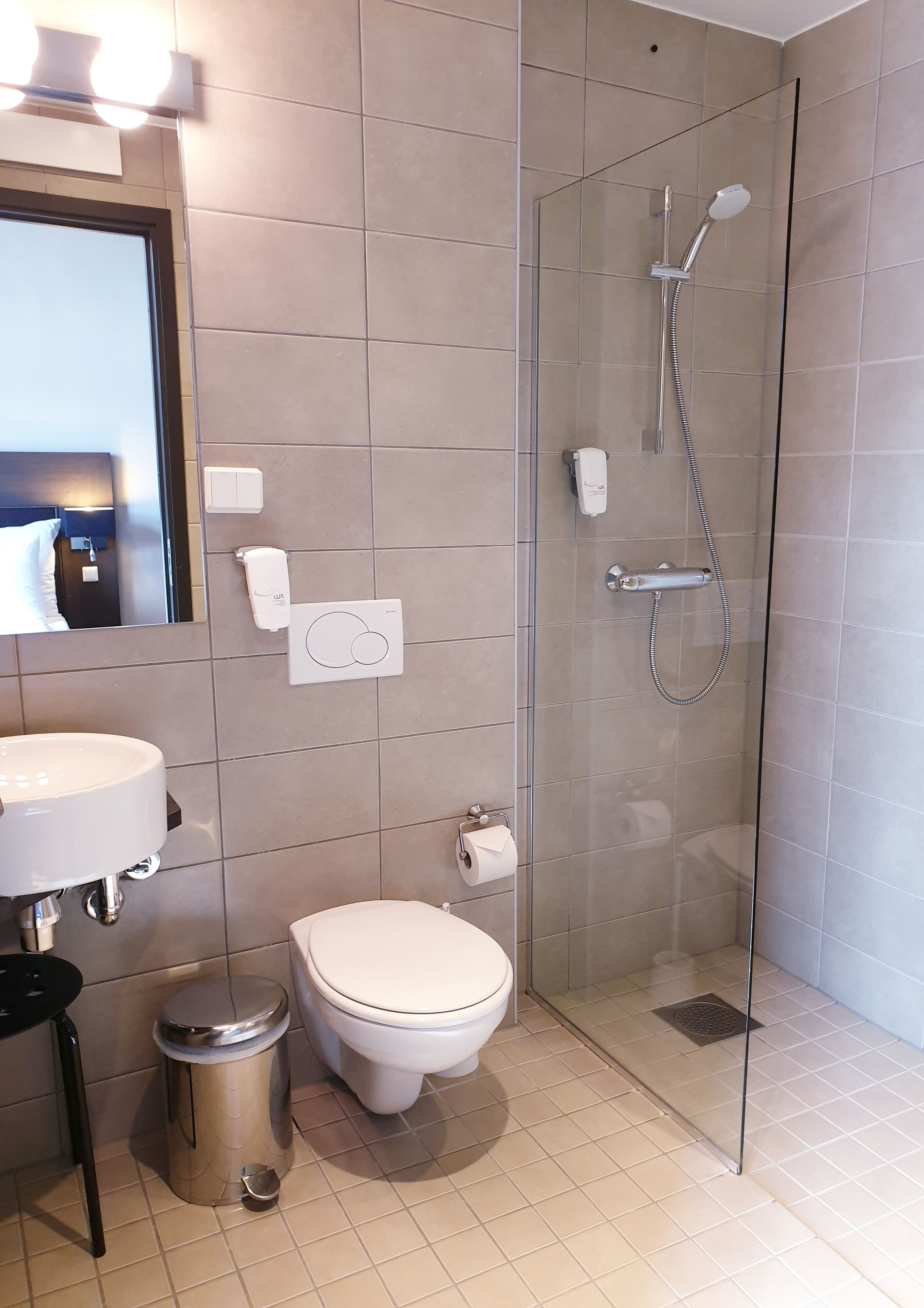 standard double room | bathroom | shower, hair dryer, towels