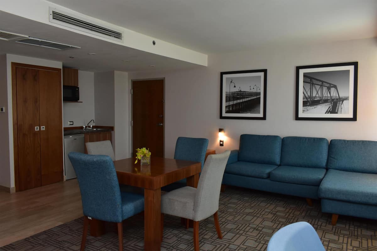 Suite, 1 King Bed, Non Smoking | Living area | 40-inch LCD TV with cable channels, TV