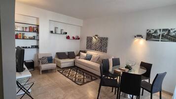 City Apartment, 1 Bedroom | Living area | TV