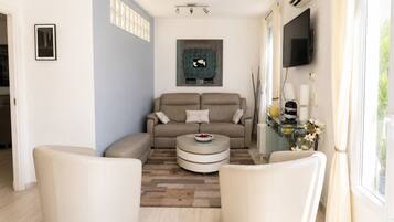 Apartment, 2 Bedrooms | Living area | TV