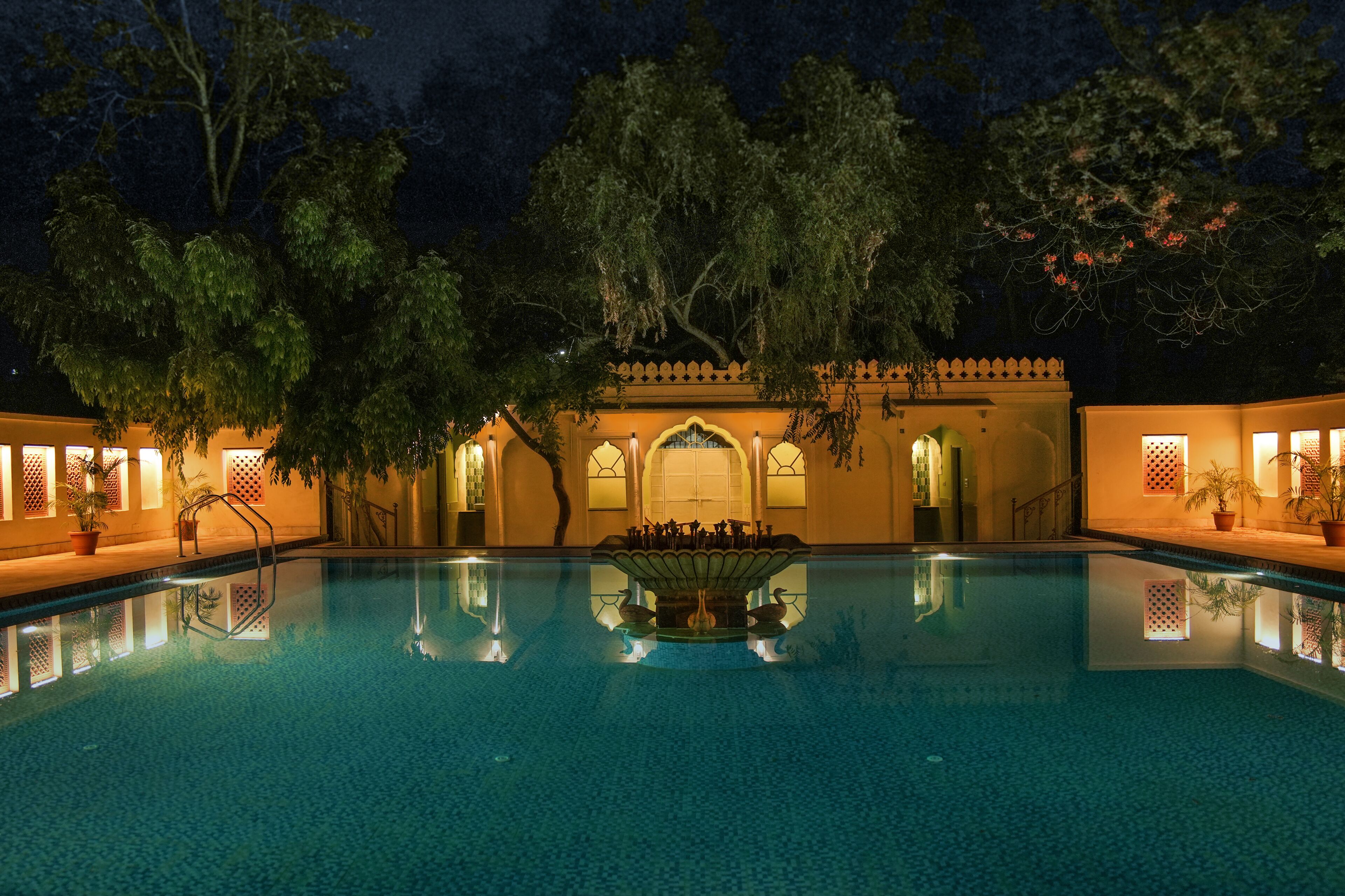 Outdoor pool, pool umbrellas, sun loungers