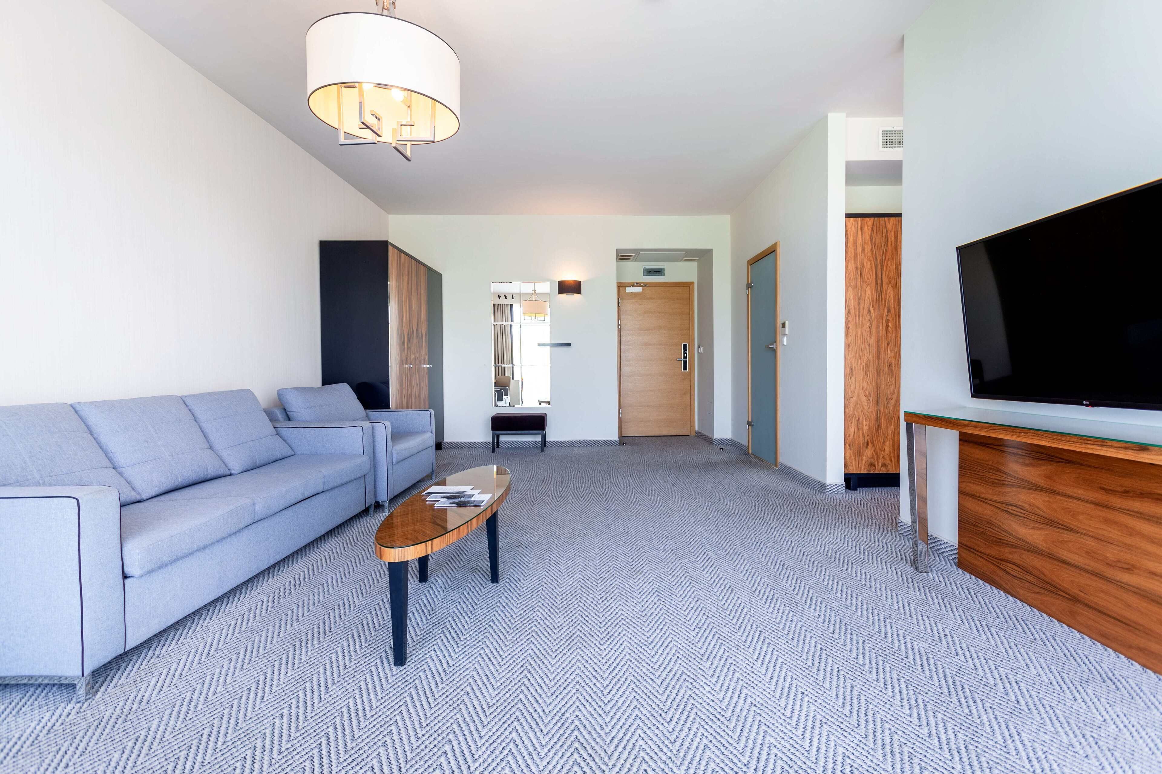 family room, balcony, partial sea view (partial sea view) | 1 bedroom, hypo-allergenic bedding, minibar, in-room safe