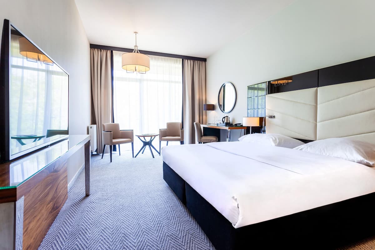 1 habitación, ropa de cama hipoalergénica y minibar