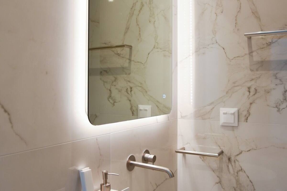 family suite | bathroom | shower, free toiletries, hair dryer, slippers