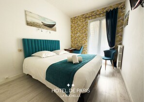 Deluxe Double Room, Balcony, Courtyard View | Desk, laptop workspace, bed sheets - Hôtel de Paris (La Rochelle)