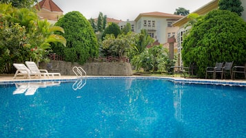 Outdoor pool, pool umbrellas, sun loungers