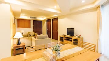 Suite, 3 Bedrooms, Kitchenette, Sea Facing | Living area | 40-inch LED TV with satellite channels, TV