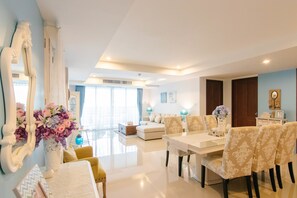 Deluxe Suite, 3 Bedrooms, Kitchenette, Partial Sea View | Living area | 40-inch LED TV with satellite channels, TV - SeaRidge Hua Hin Resort & Pool Villa (Hua Hin)