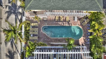 Outdoor pool, open 9:00 AM to 9:00 PM, pool umbrellas, sun loungers
